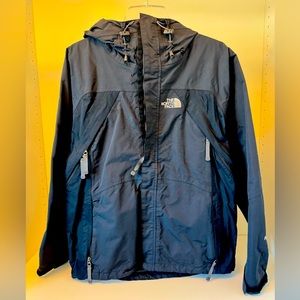 Winter jacket with hood for high-exertion activities. The North Face